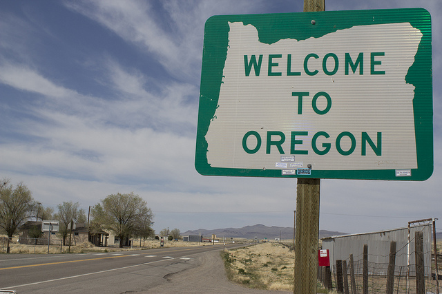 Welcome to Oregon sign post