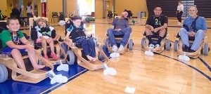 Kids and Adults on Incight's Electric Hockey Carts